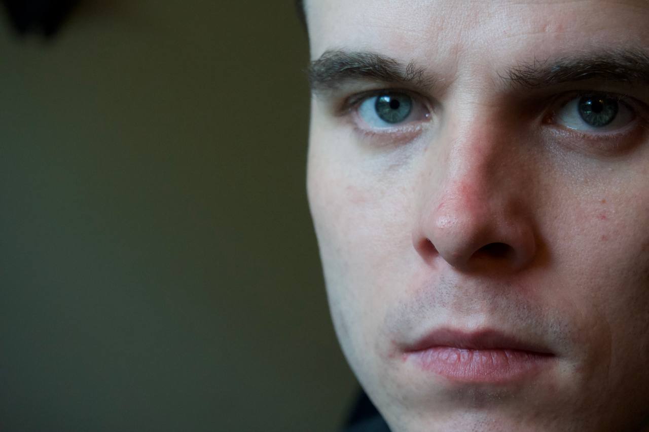 Extreme close-up portrait of Tyler Delano looking directly into the camera